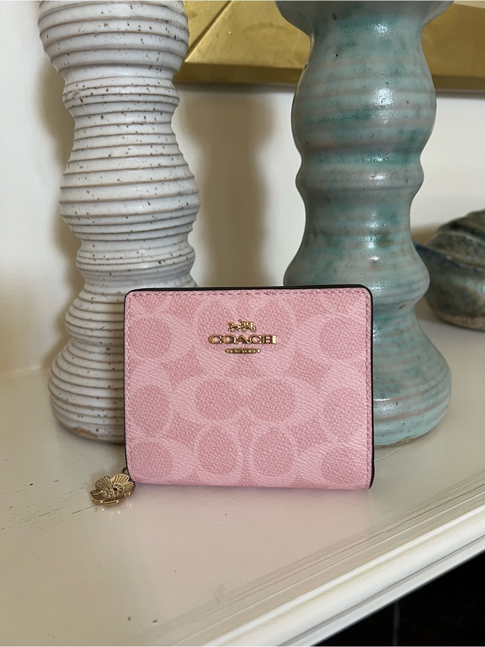 Coach Light Pink Signature Compact Wallet with Gold Hardware and Charm
